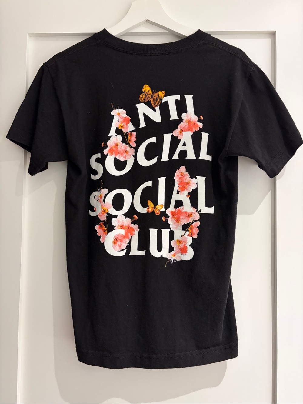 Anti Social Social Club Black Tee with Pink Floral and Orange Butterfly Print